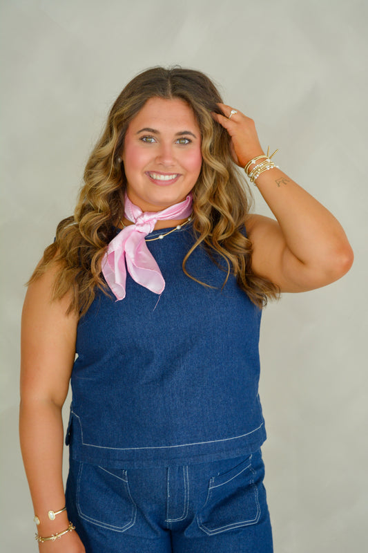 Baby Pink Western Wash Top shown on a person, featuring lightweight fabric and western-inspired design with a collar and button details.