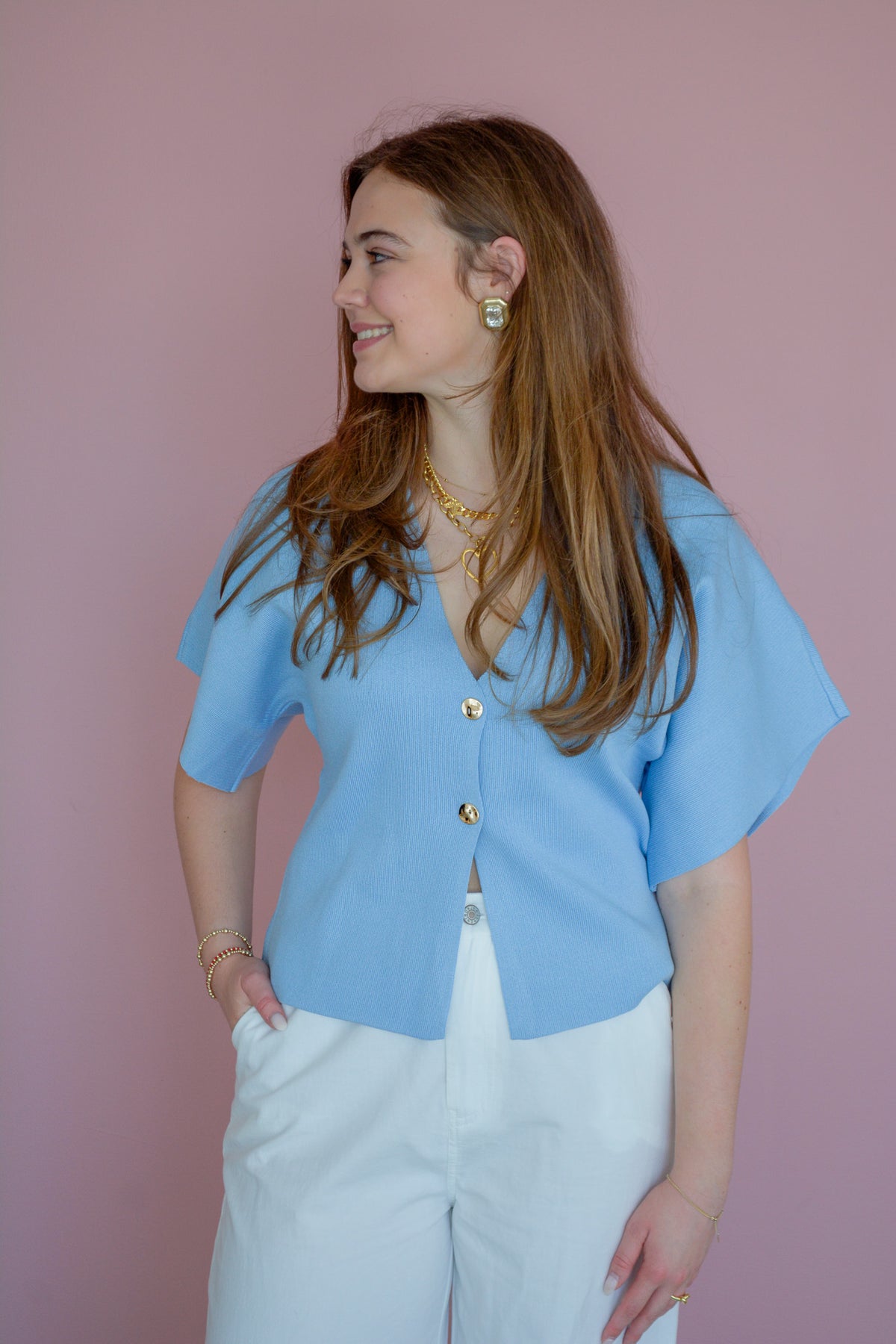 Wisteria Lane Baby Blues Top for infants, soft fabric with blue and white pattern, displayed on a hanger.