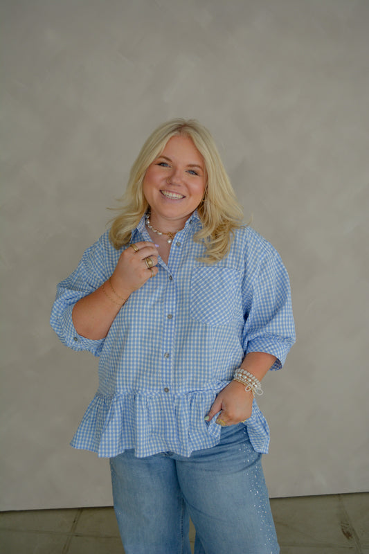 Entro The Abigail Blouse for Curvy figures, featuring a stylish, fitted design with elegant details and vibrant color.