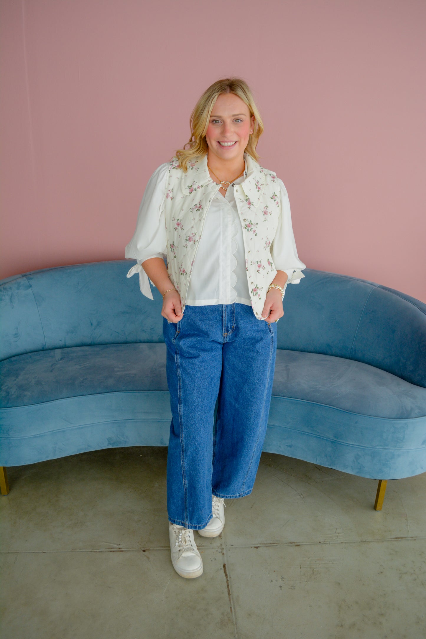 Entro The Sweet Sophistication Blouse in soft fabric with a stylish collar and button details, displayed on a hanger.