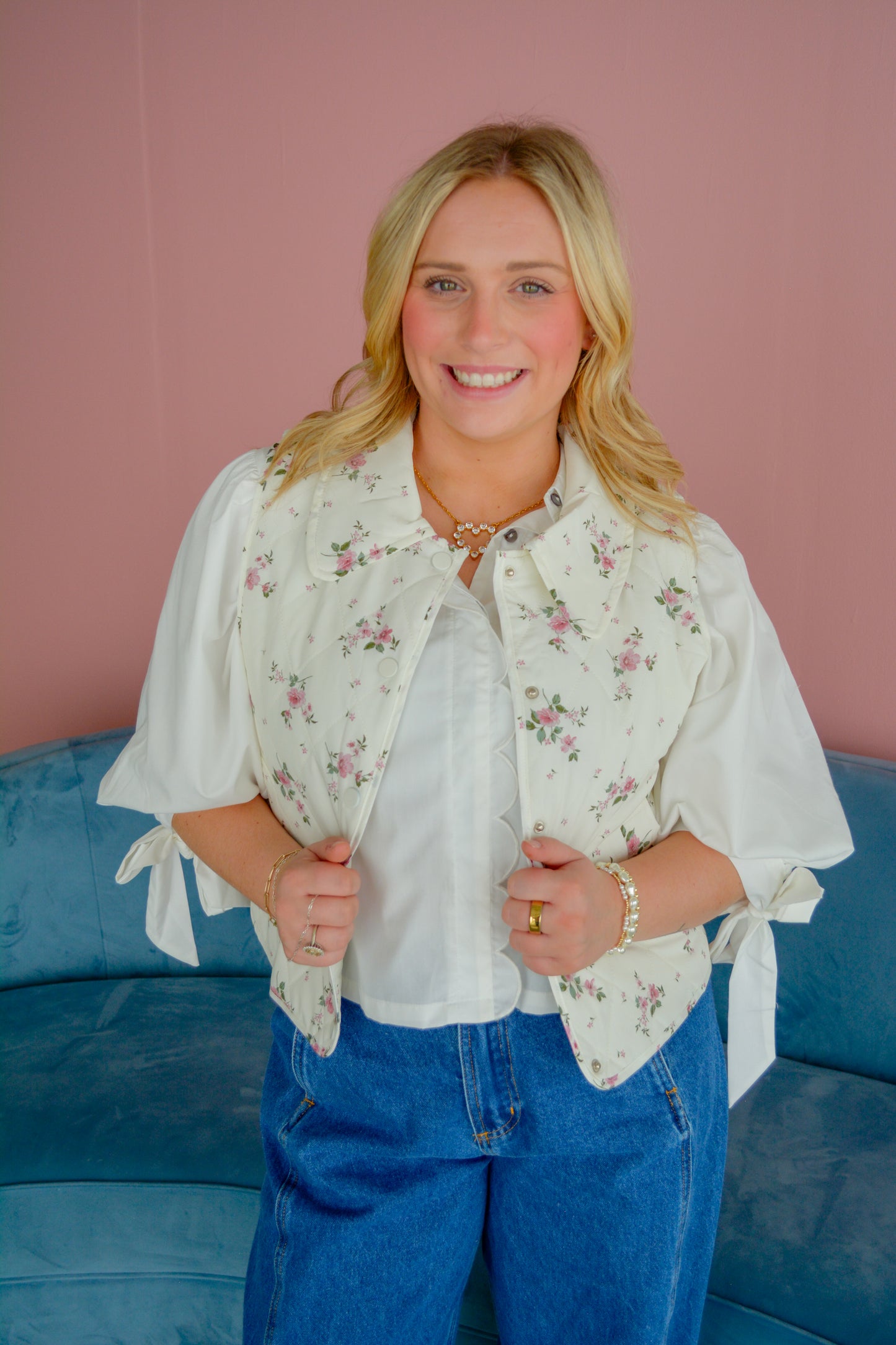 Entro Sweet Sophistication Blouse displayed on a hanger, featuring a stylish collar and elegant fabric for a refined look.