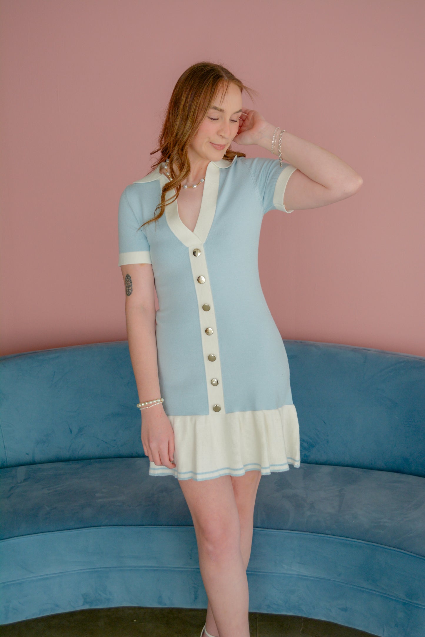 Able Magnolia Lane Dress displayed on a hanger with detailed fabric texture and stylish design, perfect for casual or semi-formal wear.