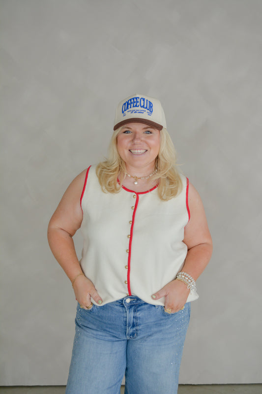 Curvy women's button vest top by Torque Fashion featuring a sleeveless design and classic button detailing.