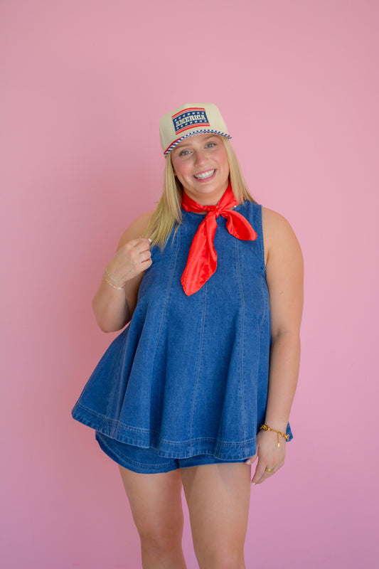 Ee:some Laidback Babe Top displayed on a hanger, featuring soft fabric and relaxed fit ideal for casual wear.