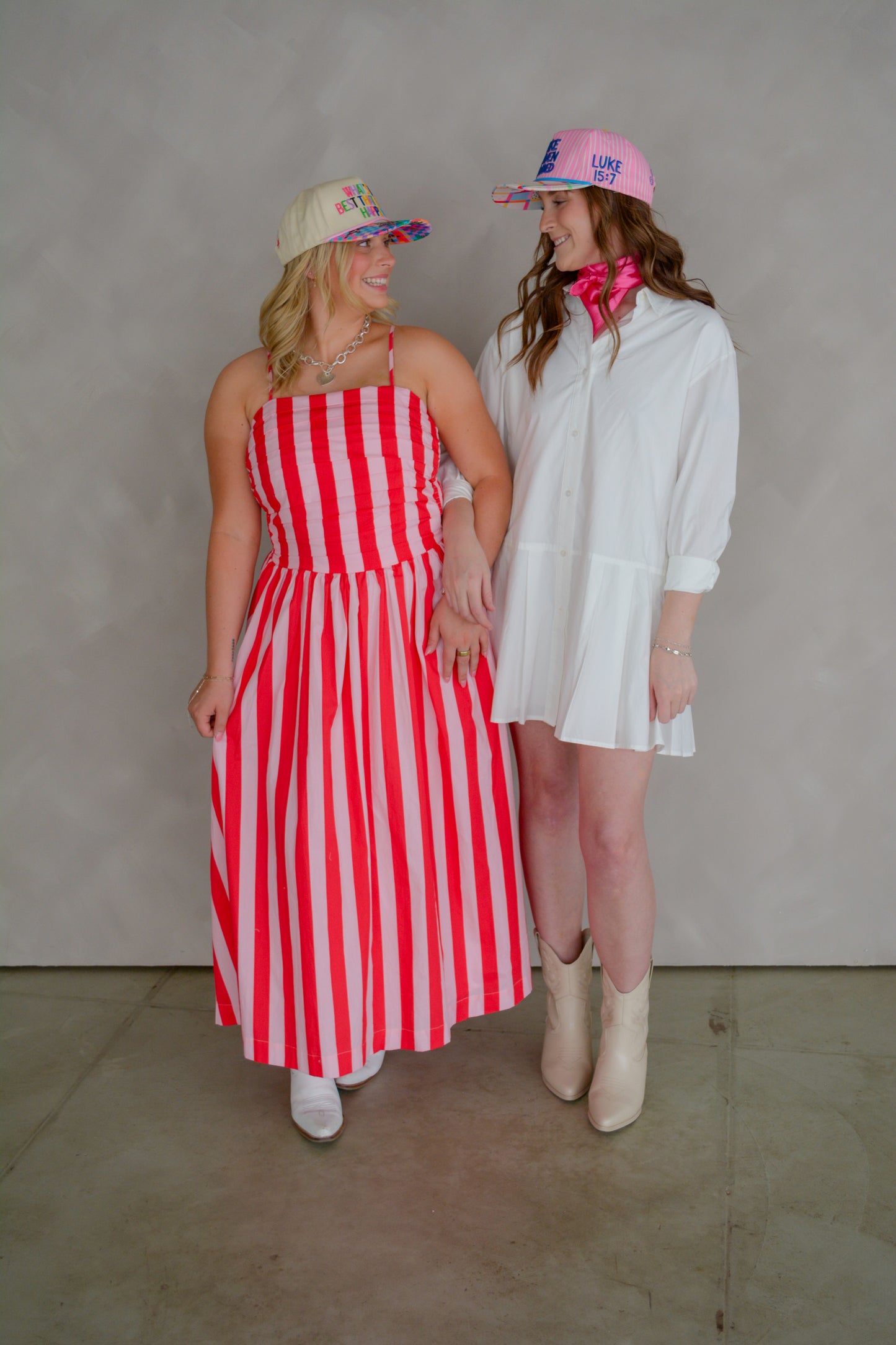 TCEC The Brunch & Go Dress displayed on a hanger, featuring a stylish, casual dress with a lightweight fabric and trendy design.