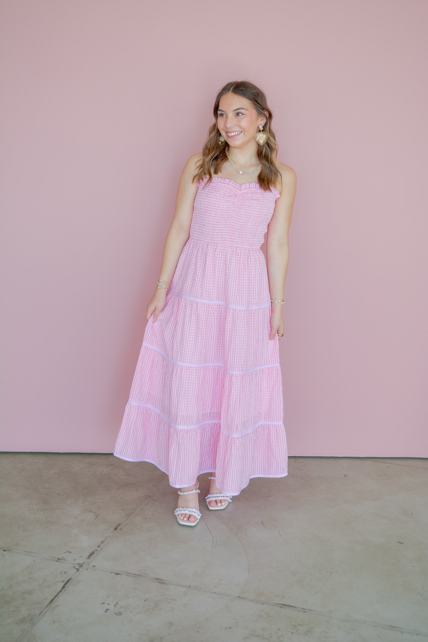 Baby Pink Soft Statement Midi Dress in pink, featuring a flowing fabric and elegant design, shown on a model.
