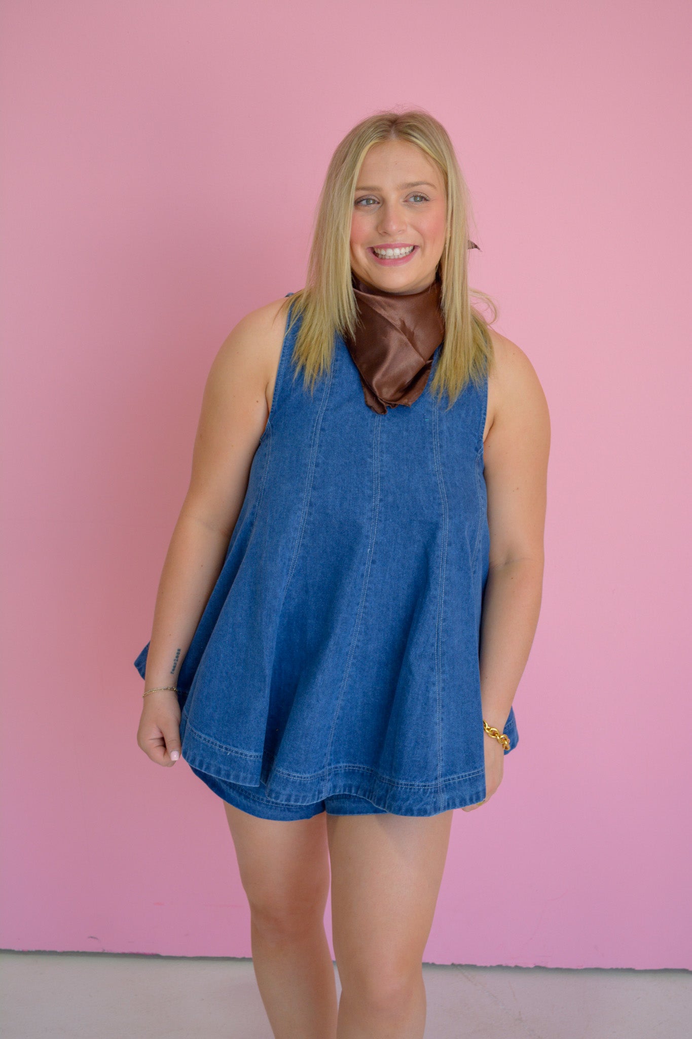 Ee:some Laidback Babe Top displayed on a hanger, featuring a relaxed fit with soft fabric and casual style.