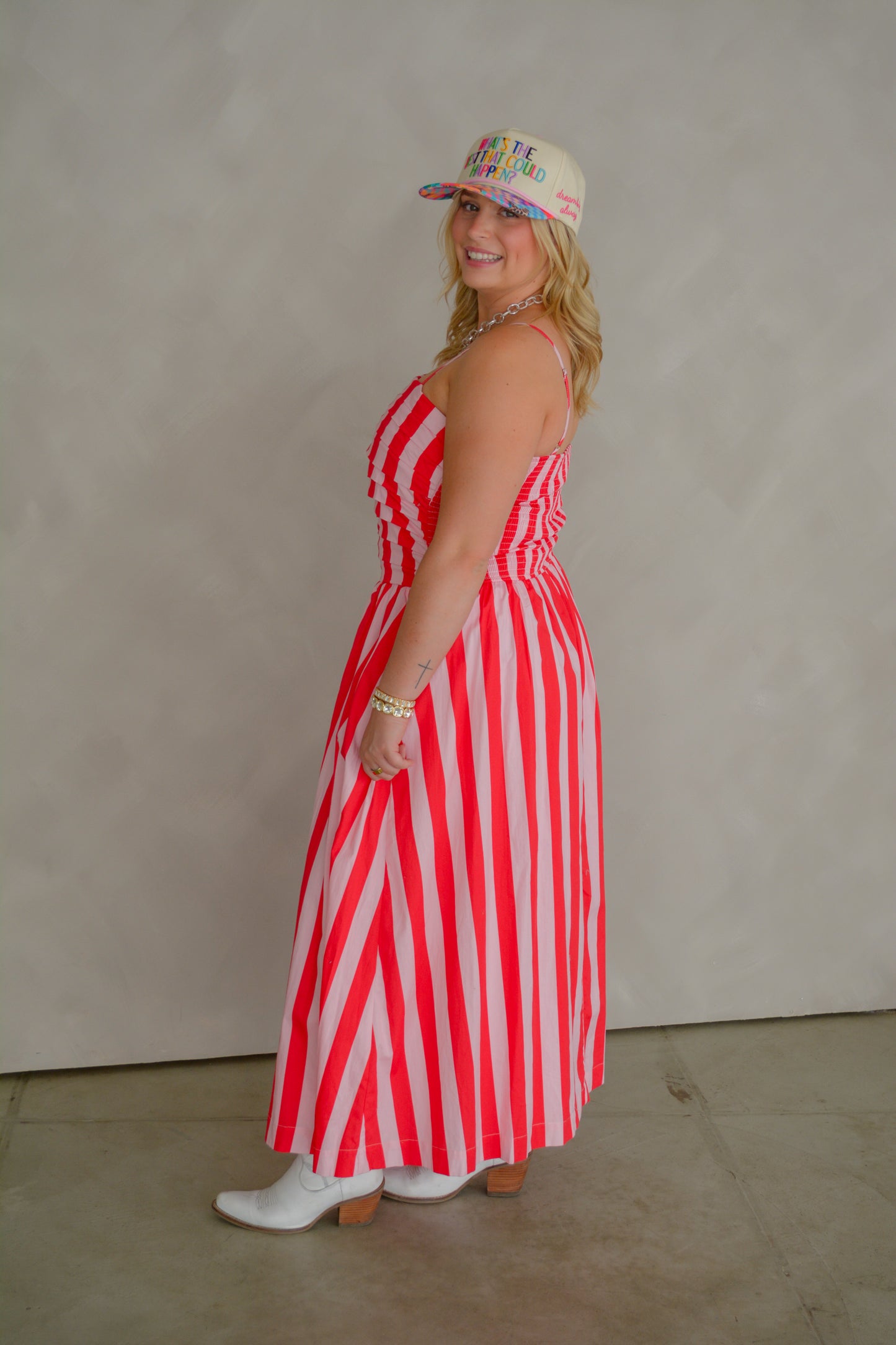 TCEC The Brunch & Go Dress displayed hanging on a hanger, featuring a stylish, casual design perfect for brunch outings.