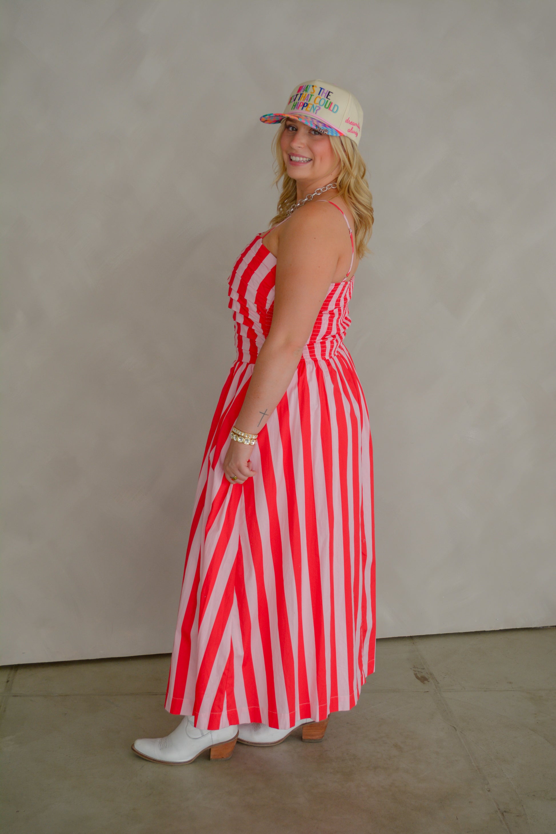 TCEC The Brunch & Go Dress displayed hanging on a hanger, featuring a stylish, casual design perfect for brunch outings.
