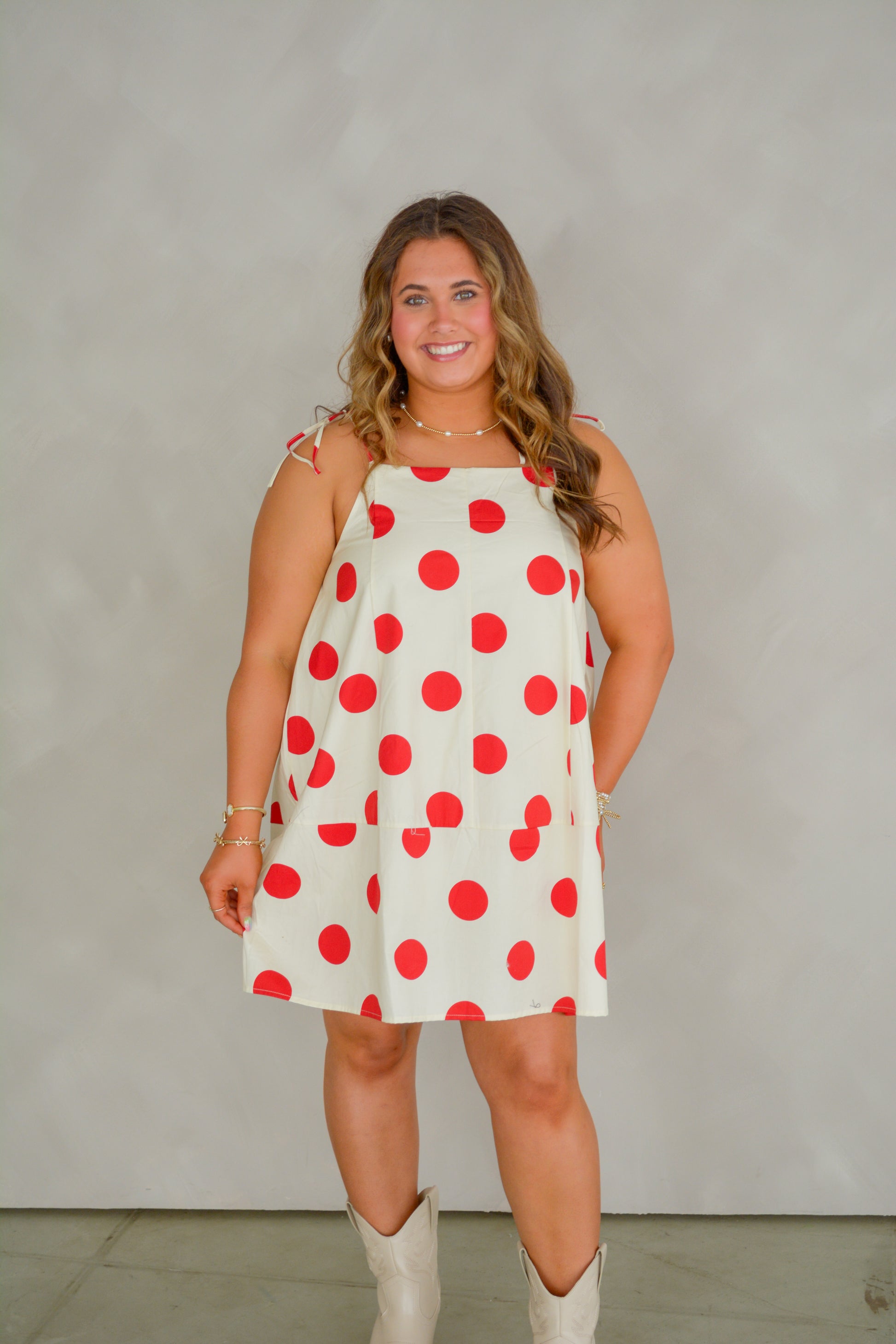Retro Romance Dress in red by Peach Love California, featuring vintage-inspired design and flowing fabric.