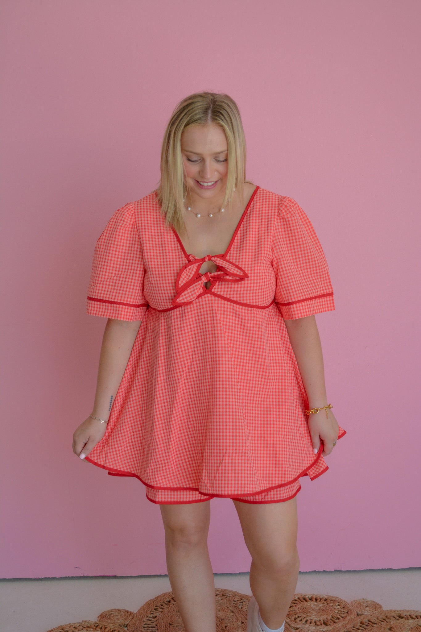 Cherry Picnic Dress by Peach Love California, featuring a summery floral pattern and lightweight fabric, suitable for outdoor gatherings.