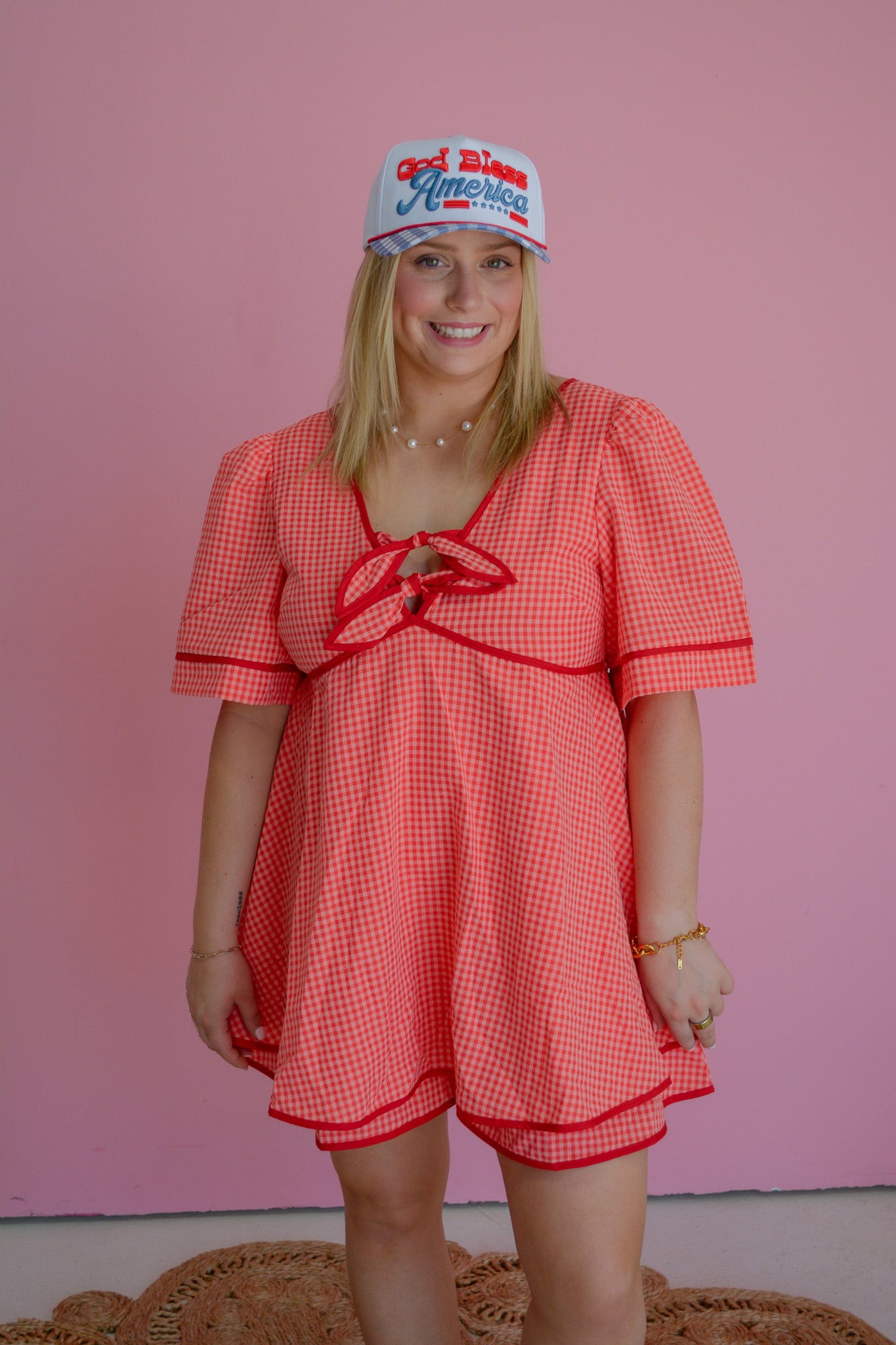Cherry Picnic Dress by Peach Love California featuring a flowy fabric, cherry print, and summer-ready style.