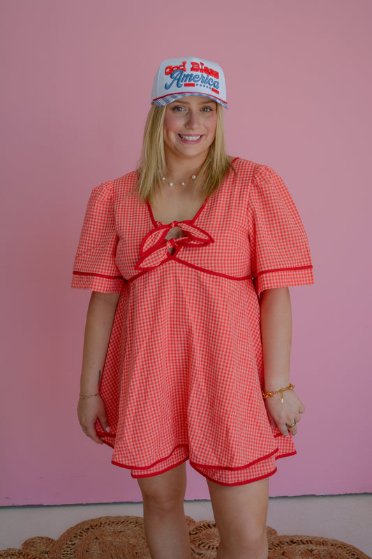 Cherry Picnic Dress by Peach Love California featuring a flowy fabric, cherry print, and summer-ready style.