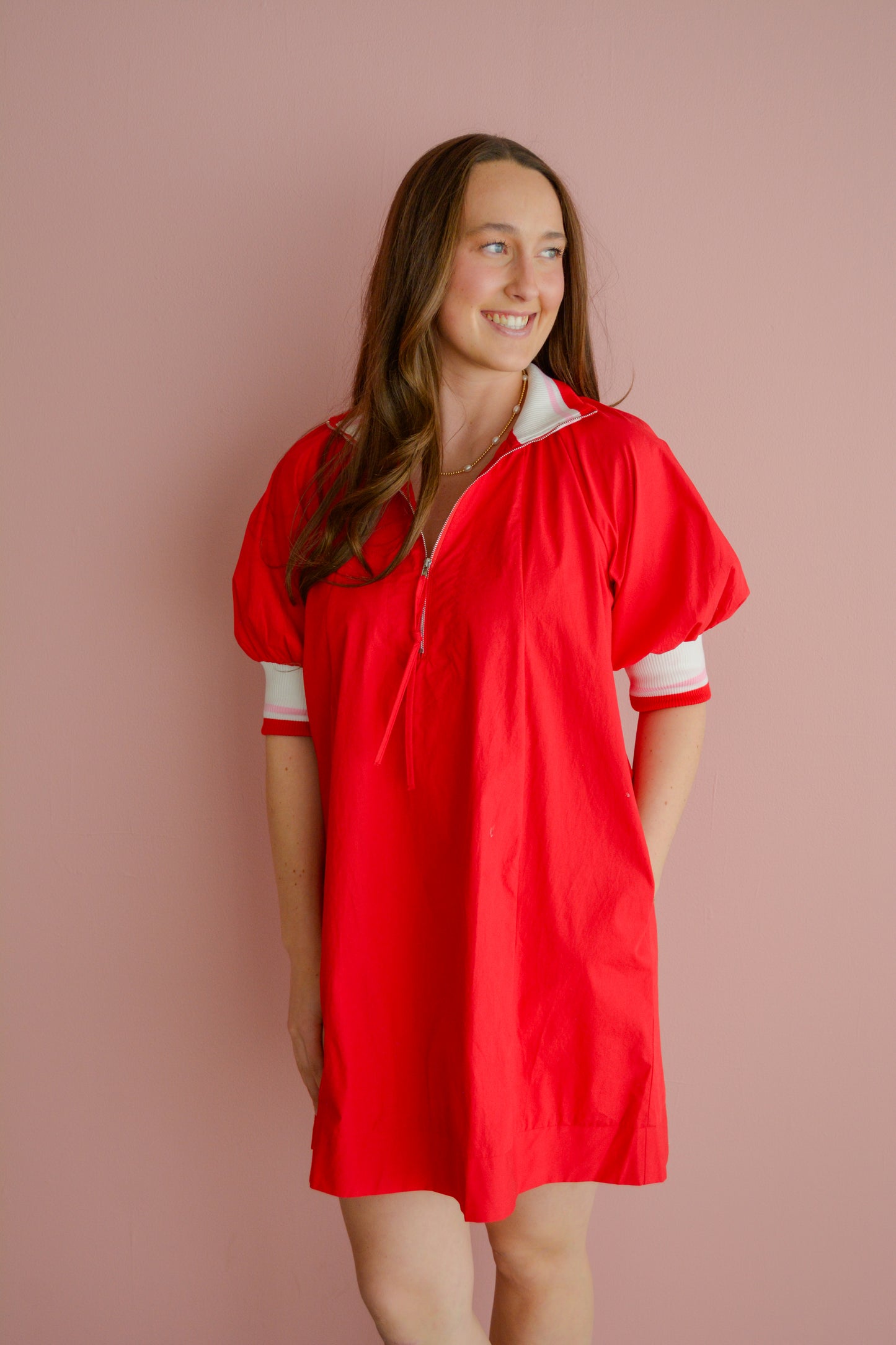 She & Sky Sunday Stroll Half-Zip Mini Dress featuring a casual fit and soft fabric, displayed on a hanger.