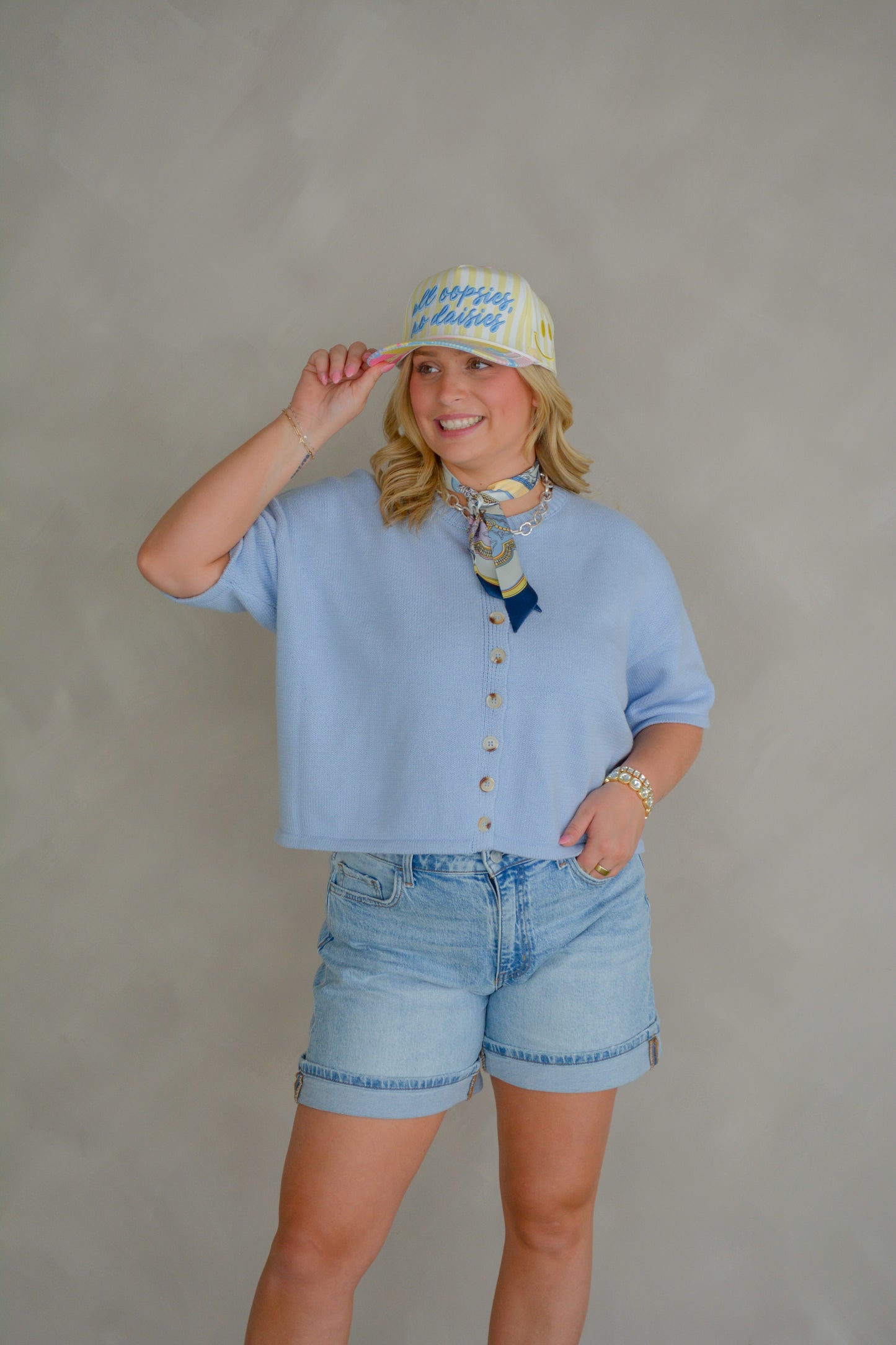 Wishlist Apparel Coastal Climate Top displayed on a hanger, showcasing its lightweight, breathable fabric and stylish design.
