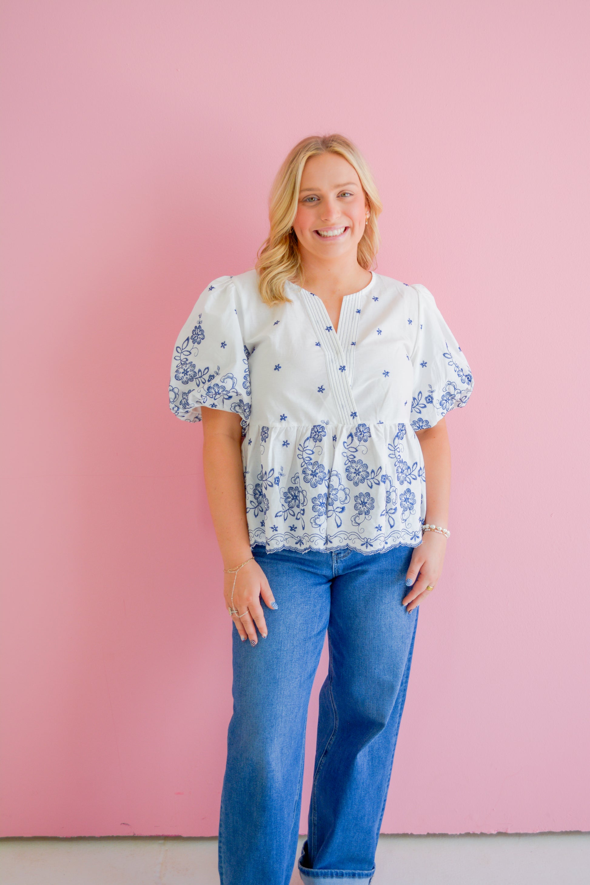 She+Sky Midnight Floral Blouse featuring a dark background with vibrant floral patterns and a relaxed fit.