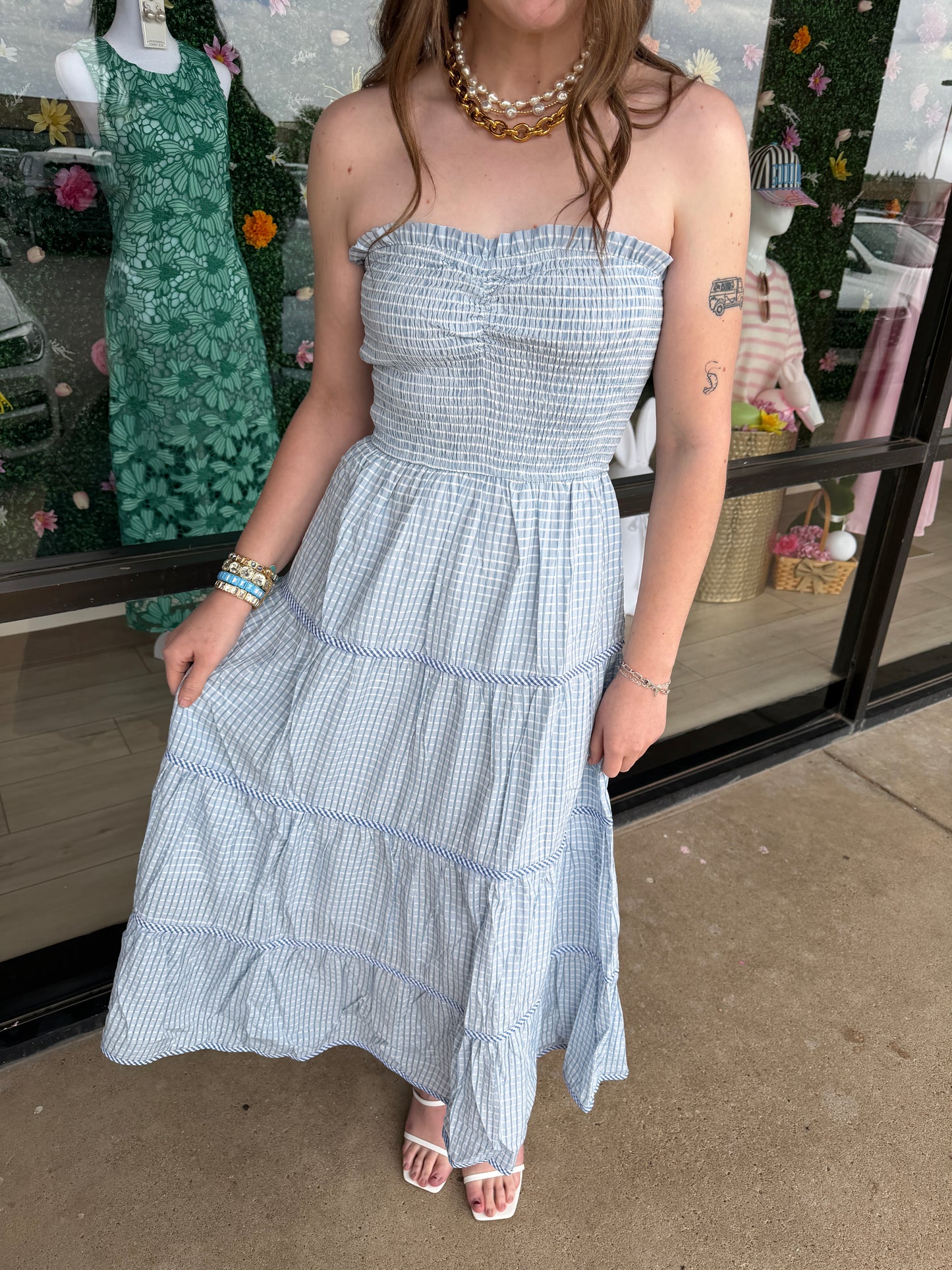 Baby Pink Soft Statement Midi Dress in baby blue, showcasing a flowing, elegant design with a fitted waist and stylish neckline.
