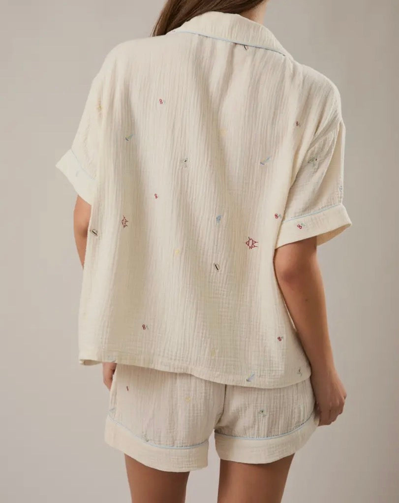 LE LIS The Vacation Edit Top shown in a full view, featuring a stylish, lightweight design perfect for summer or vacation wear.