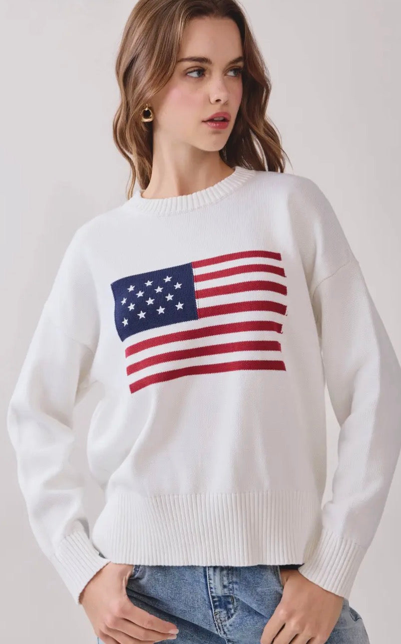 TCEC Stars & Stripes sweater featuring red, white, and blue star patterns on soft knit fabric.