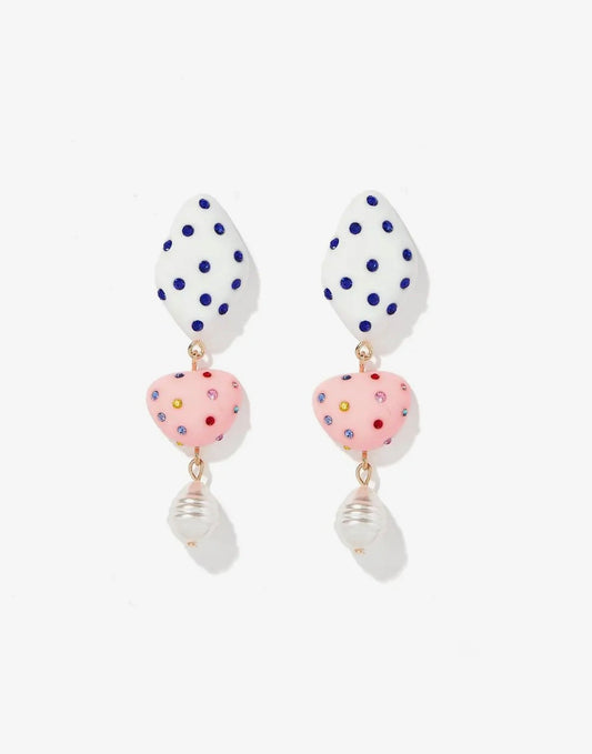 Linny CO Bijou Statement Earrings featuring bold, intricate designs with sparkling embellishments on a white background.