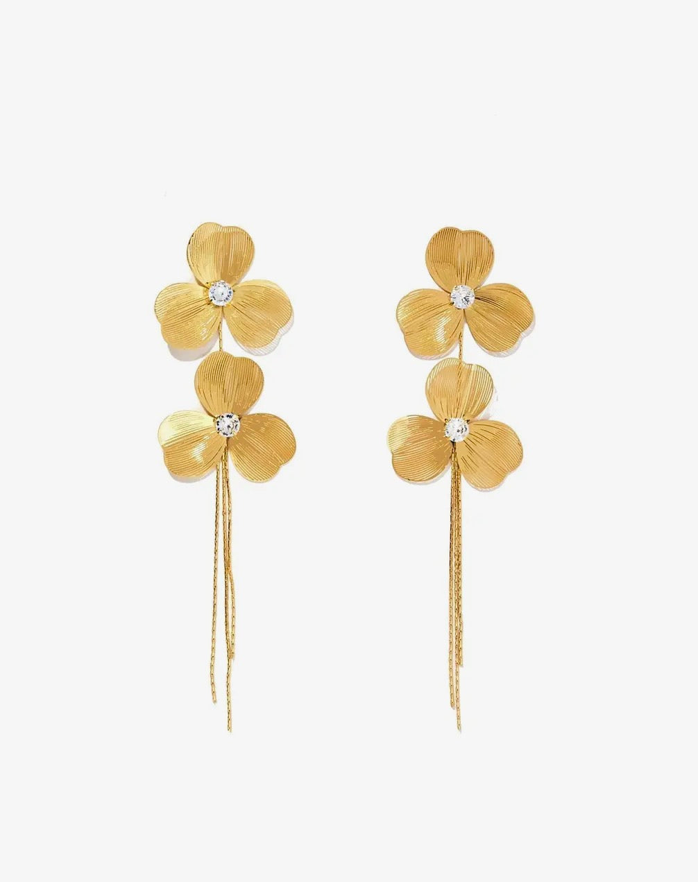 Linny CO Sydney Statement Earrings with bold, modern design featuring geometric shapes and metallic finish.