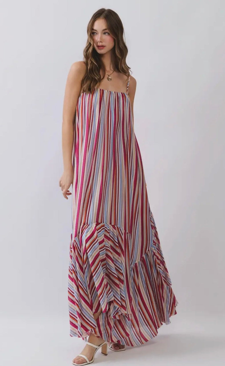 TCEC Summer Skies Maxi Dress in lightweight fabric with floral patterns, full-length view showcasing its flowing silhouette.