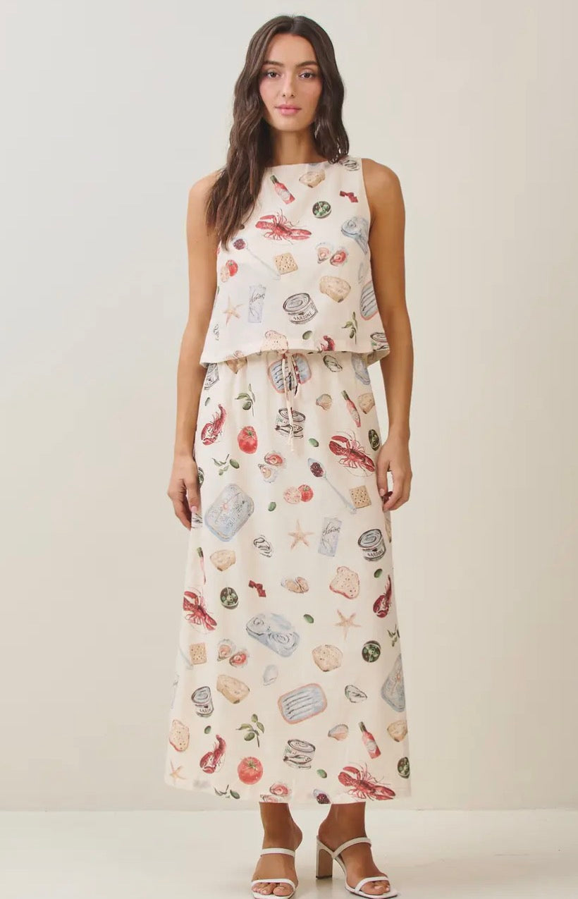 Able Seaside Pantry Tank Top, casual sleeveless top in soft fabric, displayed on a hanger against a neutral background.
