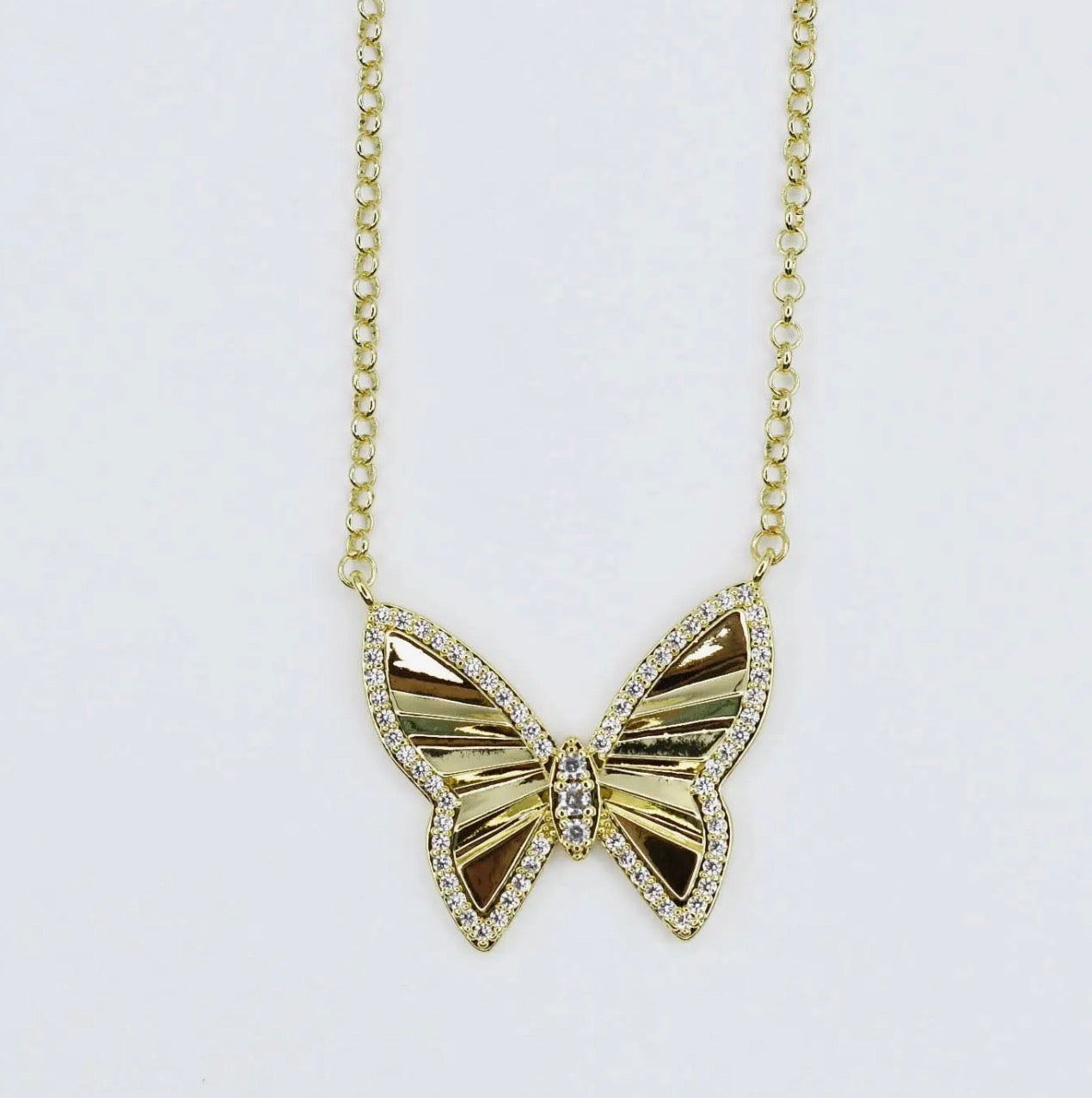 Treasure Jewels Radiant Flight Necklace featuring a delicate chain and sparkling pendant with intricate gemstone detailing.