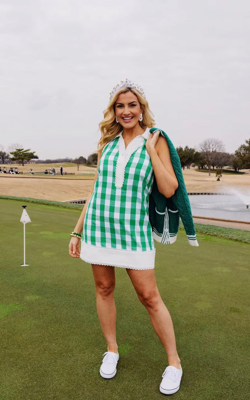 Brianna Cannon Picnic Darling Dress displayed on a hanger with floral pattern and flowing fabric, perfect for summer outings.