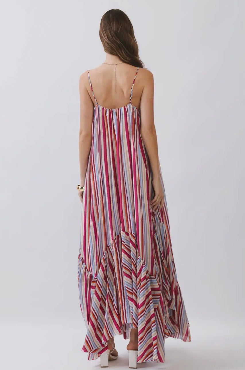 TCEC Summer Skies Maxi Dress displayed on a hanger, featuring a flowy fabric, floral pattern, and sleeveless design.