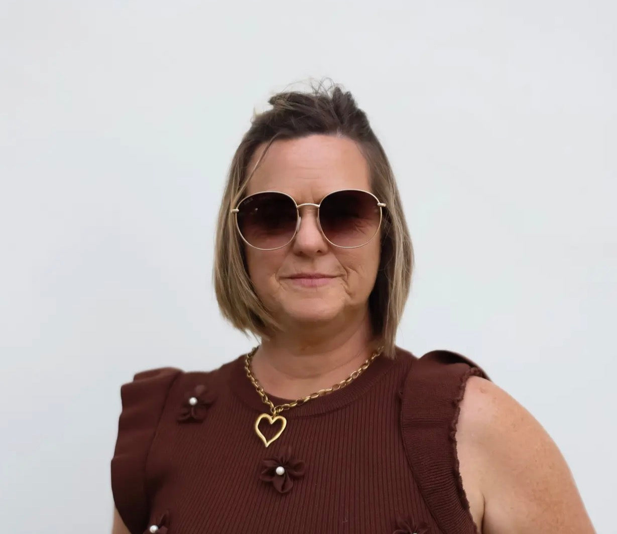 Dax Eyewear Georgie brown full-rim eyeglasses with rectangular frames and clear lenses, stylish and lightweight design.