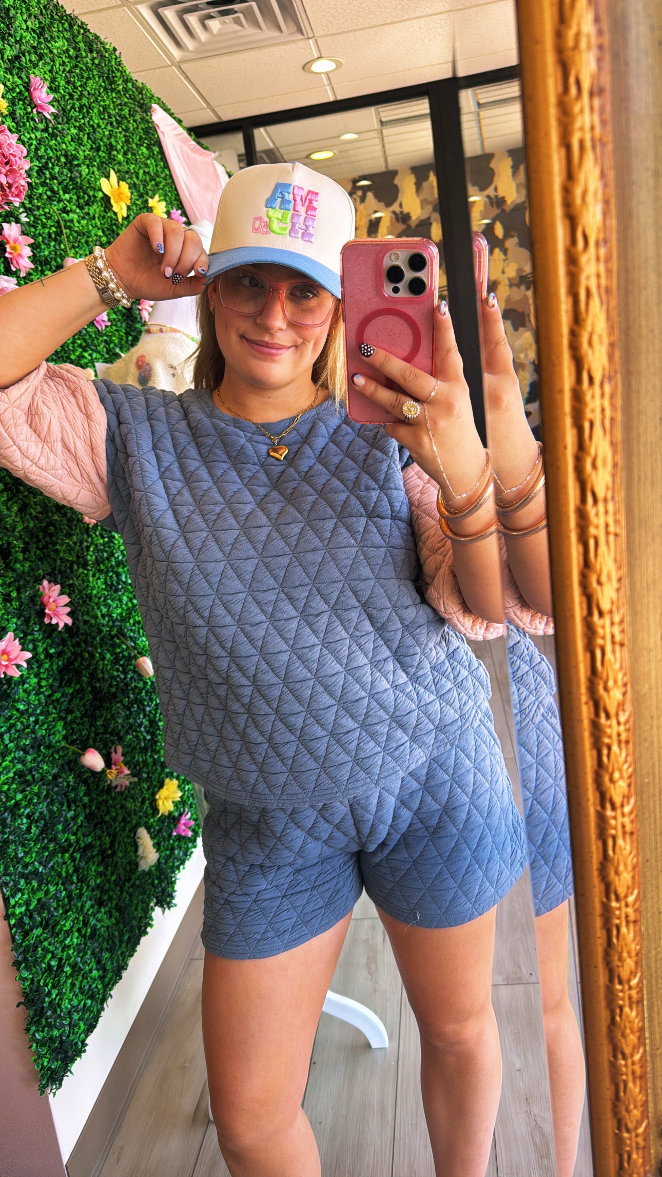 Blue MAJH hat from Summer Tees displayed on a model, featuring a casual style suitable for summer outings.