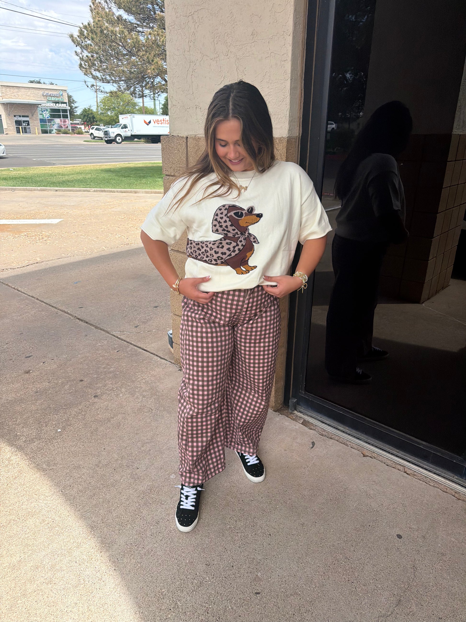 Rustic rose plaid jeans by Peach Love California featuring a relaxed fit and classic denim style.