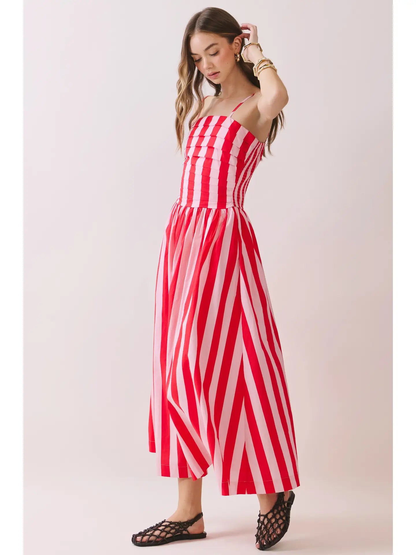 TCEC The Brunch & Go Dress, stylish sleeveless summer dress with floral pattern and lightweight fabric, displayed on a hanger.