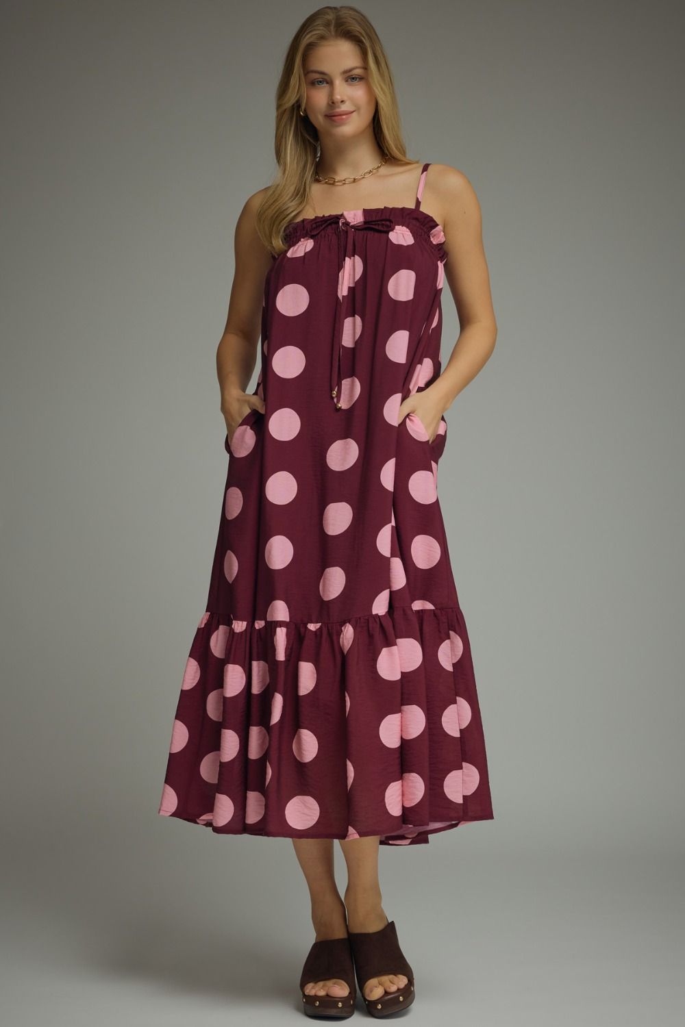 Entro plum polka dot maxi dress with sleeveless design and flowing fabric, perfect for casual or summer wear.