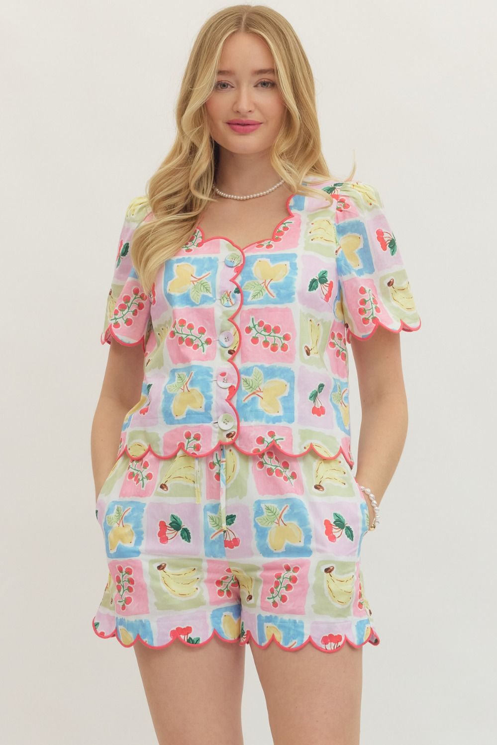 Entro Fruit Splash Blouse featuring vibrant fruit print, lightweight fabric, and stylish design perfect for casual and summer wear.