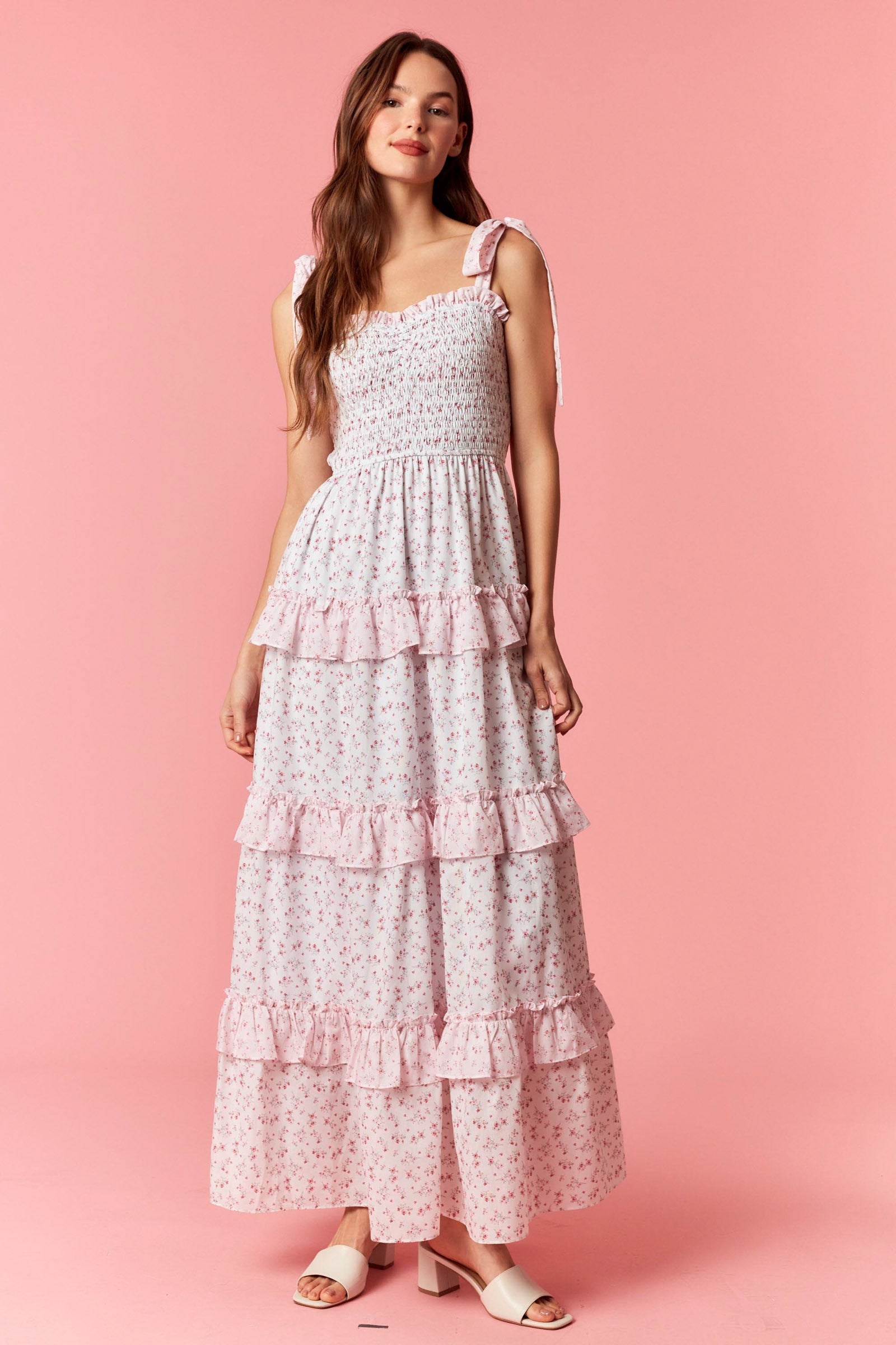 Pink Soft Bloom maxi dress by Peach Love California, flowing fabric, sleeveless design, and floral pattern perfect for summer.