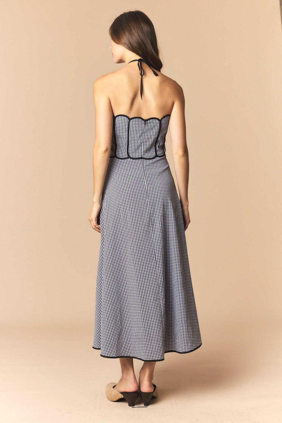 Black Gingham Grace Dress by Peach Love California, featuring a stylish gingham pattern and feminine fit.