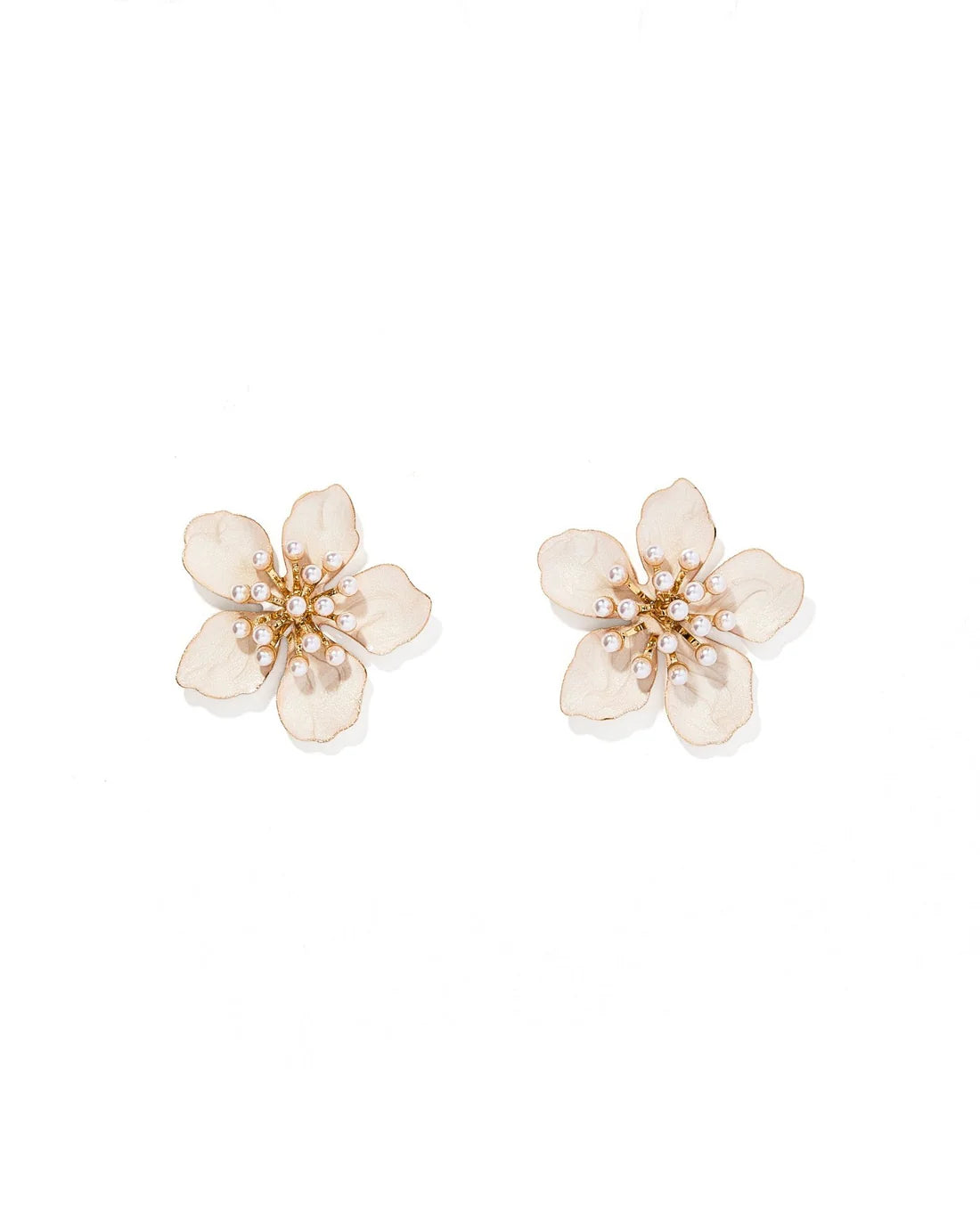White Monroe statement earrings by Linny Co. featuring bold, geometric design and gold accents on a clean background.